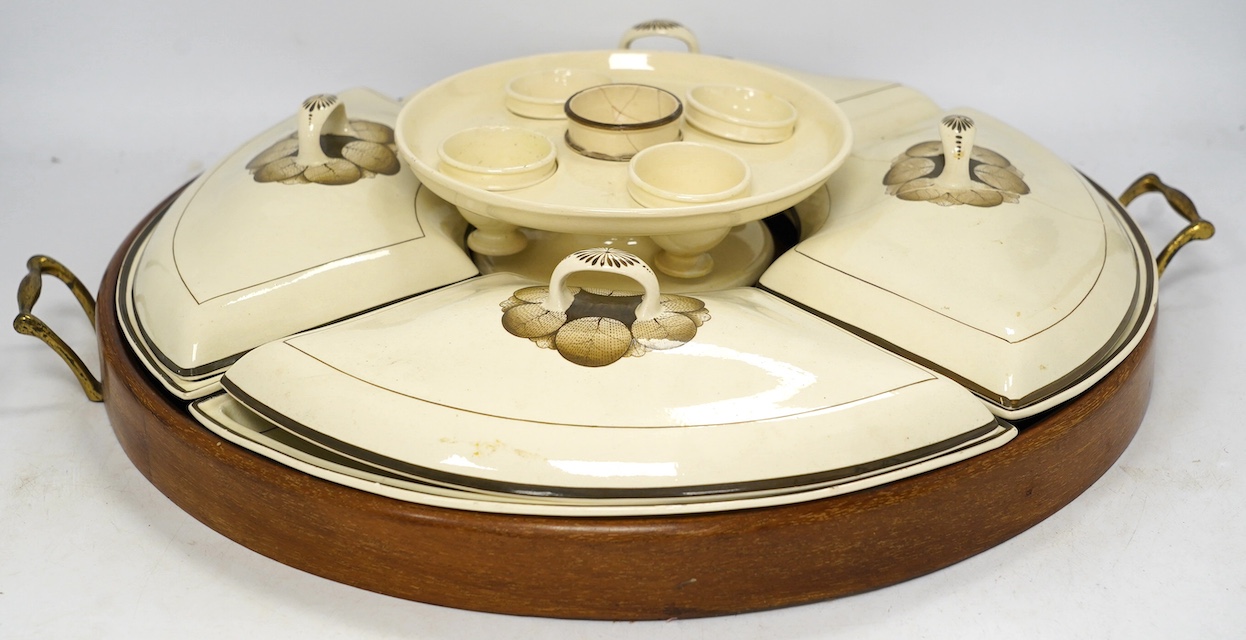 A late 18th century creamware breakfast set, fitted within later mahogany tray, 52cm handle to handle. Condition - some damage
